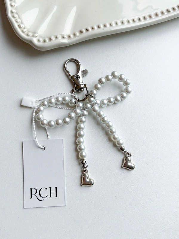 Producto - Bag charm coquette (Perla)