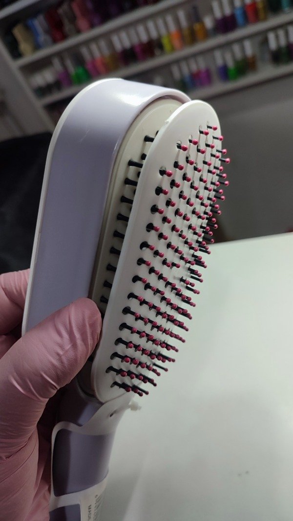 Producto - Cepillo auto limpiable