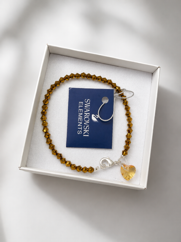 Producto - Pulsera Swarovski con dije corazón color marron