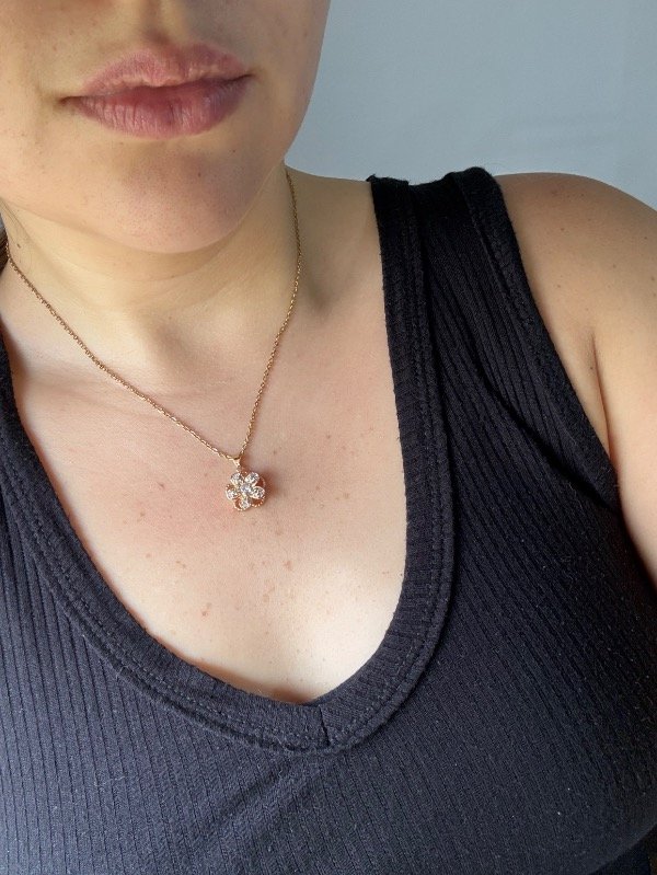 Producto - Collar giratorio flor