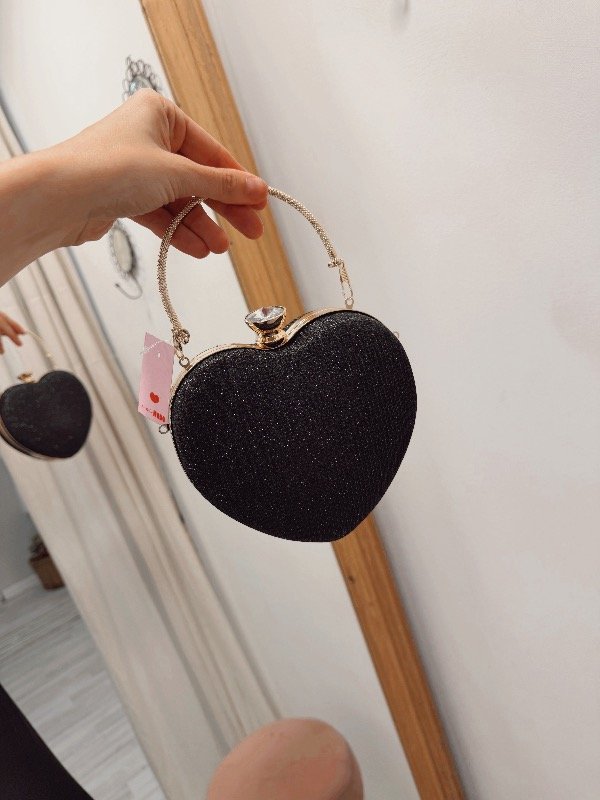 Producto - Clutch Heart