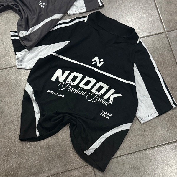 Producto - CHOMBA BOXY NOOOK NEGRO