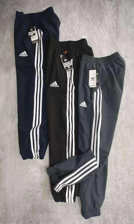 Producto - Pantalon rompeviento Adidas