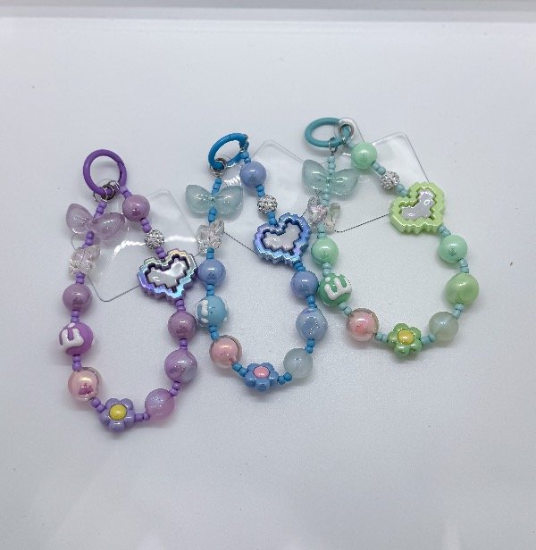 Producto - Llaveros corazon pulsera para celular surtido (900086)