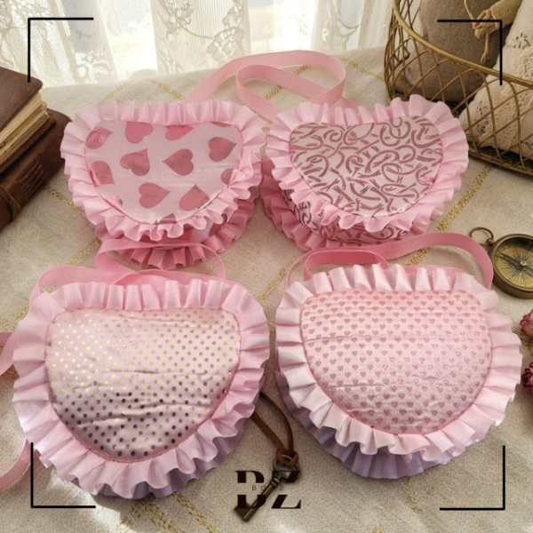 Producto - CARTERITA INFANTIL CORAZON CON BRILLO X UNIDAD 1150-1