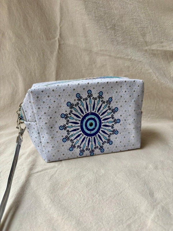 Producto - Neceser ojos redondo