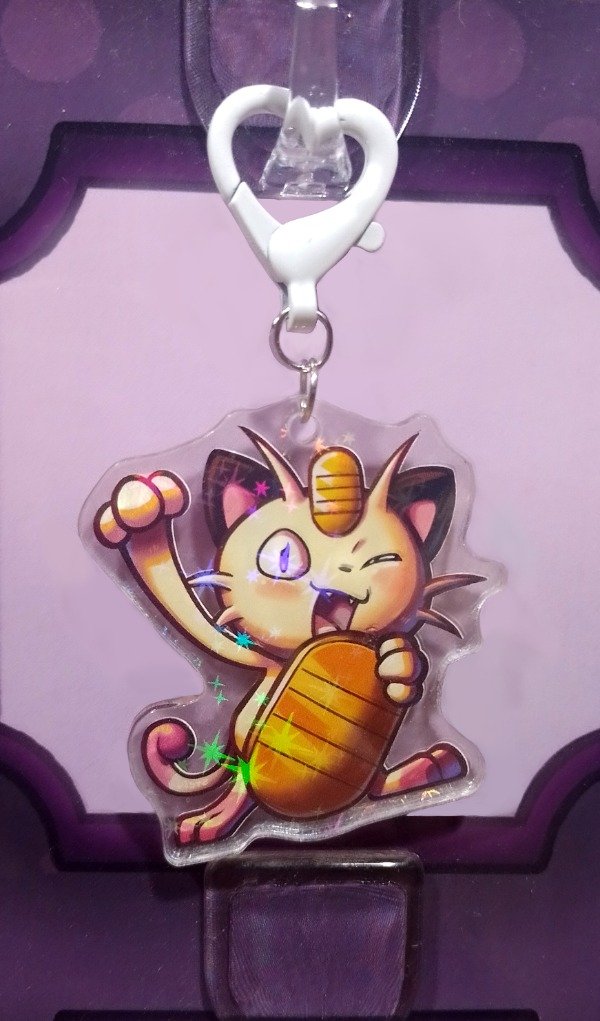 Producto - Llavero Meowth
