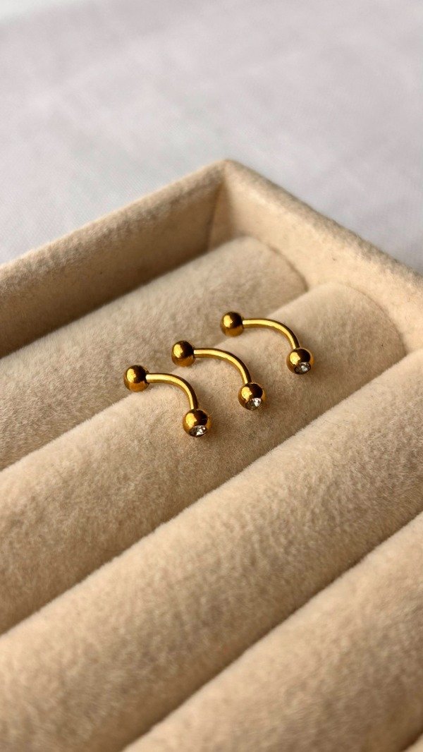 Producto - Piercing dorado BANANITA simple strass