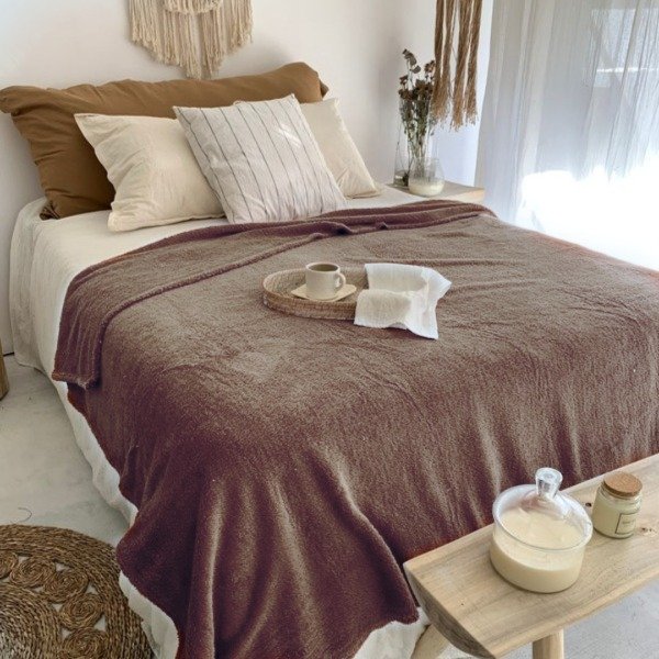 Producto - Corderito Bifaz Marrón 0.90x1.60mts