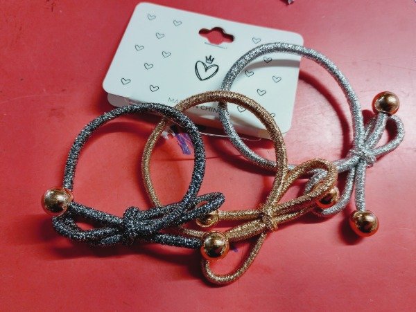 Producto - Colitas brillo  lazo