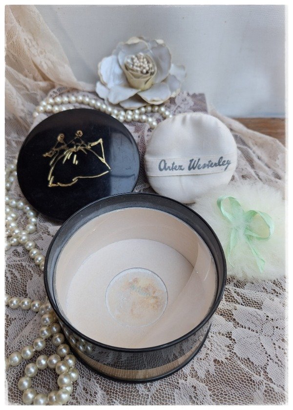 Producto - Polvera o Talquera Negro y dorado