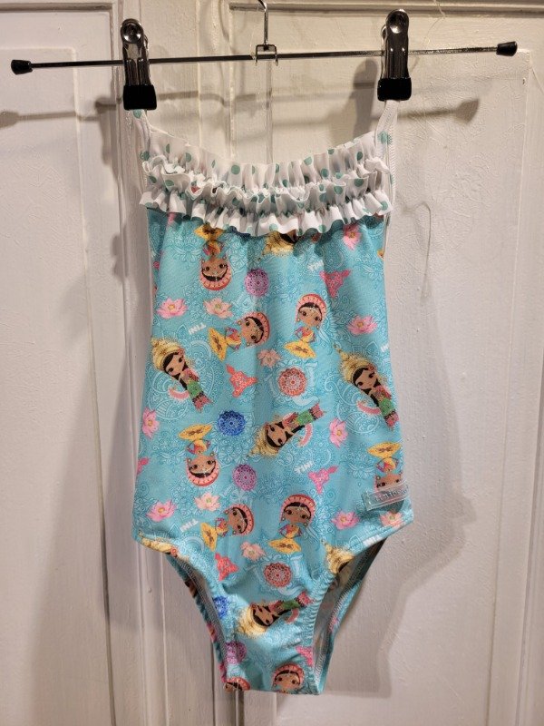 Producto - Traje de baño TINI BEACH loto celeste Nueva c/etiq Talle 6 años - PRECIO: 24X