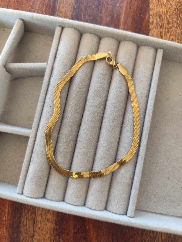 Producto - Tobillera plana . Acero dorado