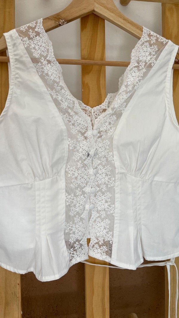 Producto - MUSCU CON LAZO