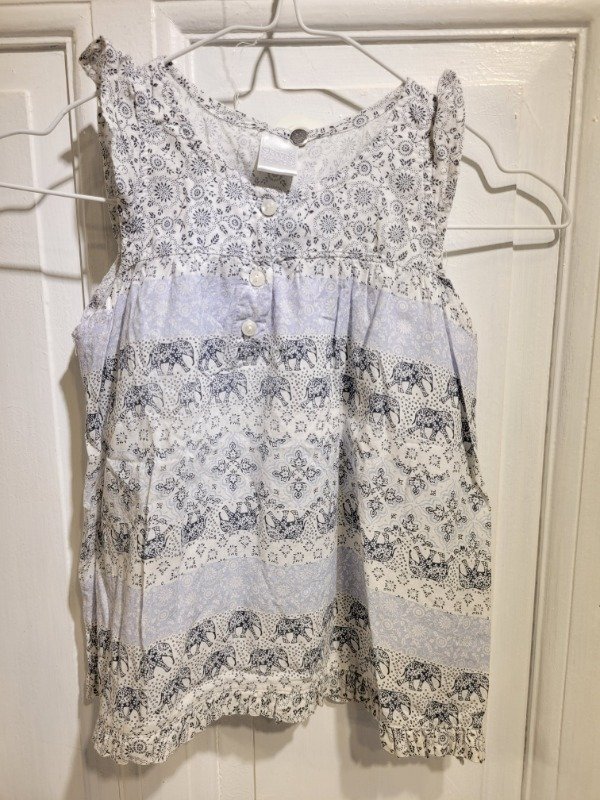 Producto - Musculosa SKOOP'S blanca con azul Talle 6 años - PRECIO: 7X