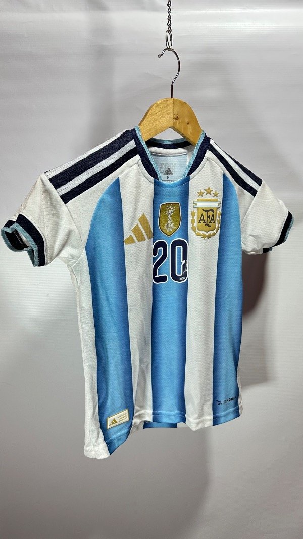 Producto - Mac Allister Argentina Titular 2026 Oficial Mundial EE.UU/Canada/Mexico Niños