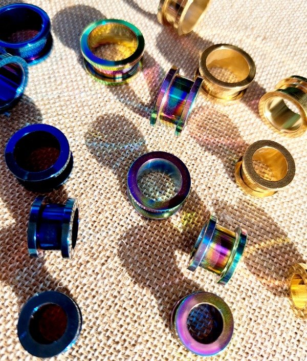 Producto - Expansores acero dorado ,azul,tornasol