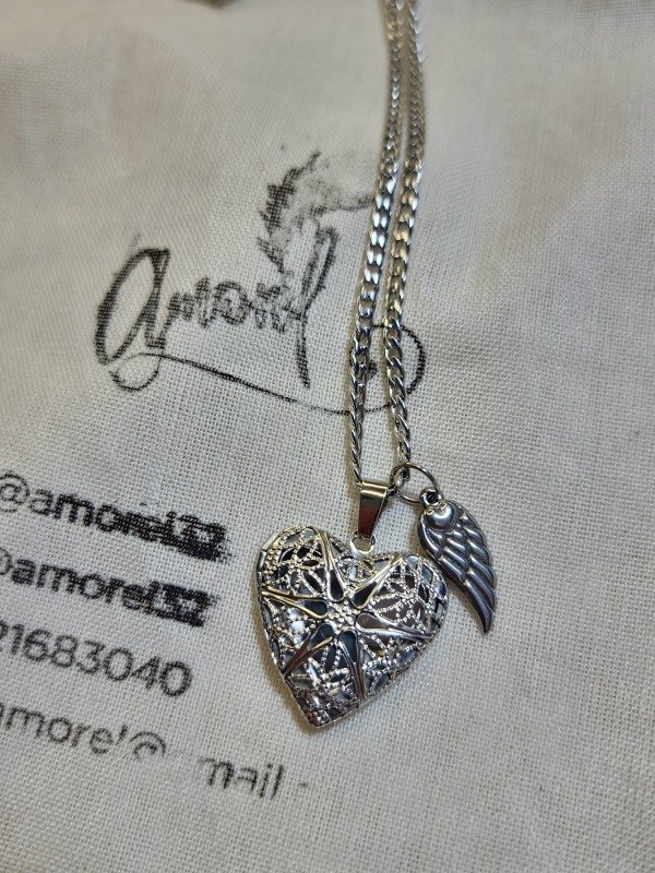 Producto - Relicario Corazón de acero y alita