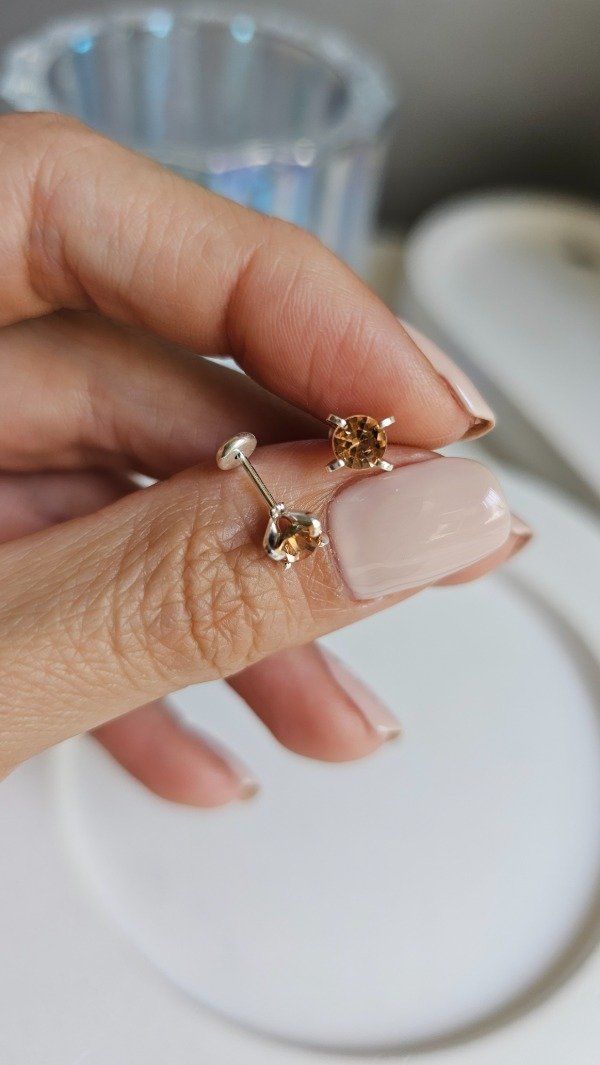 Producto - Abridor engarzado ámbar con grifa . Plata