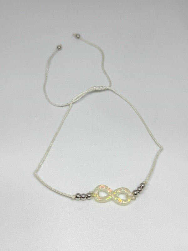 Producto - Pulsera de hilo dije infinito blanco
