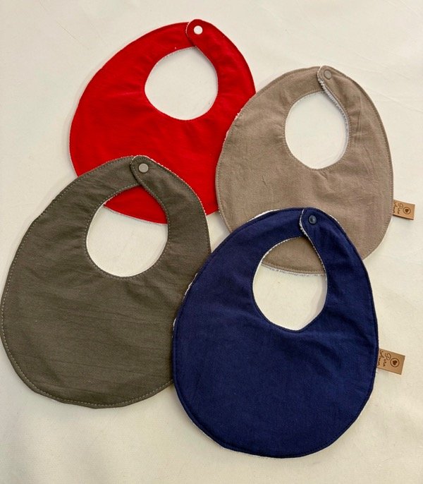 Producto - Baberos impermeables lisos