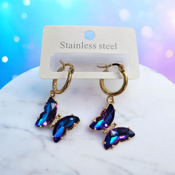 Producto - Aros dorados mariposa azul tornasol