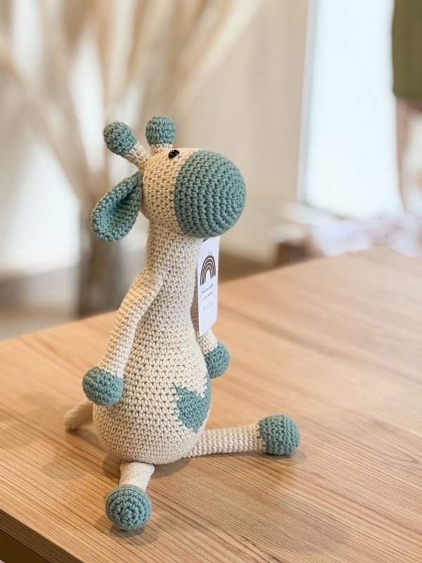 Producto - Muñeco de apego jirafa verde