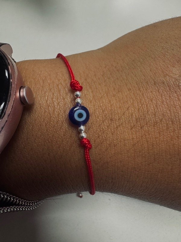 Producto - Pulse regulable roja protectora ojito azul doble bolita Plata