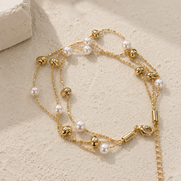 Producto - Pulsera triple con perlas AD