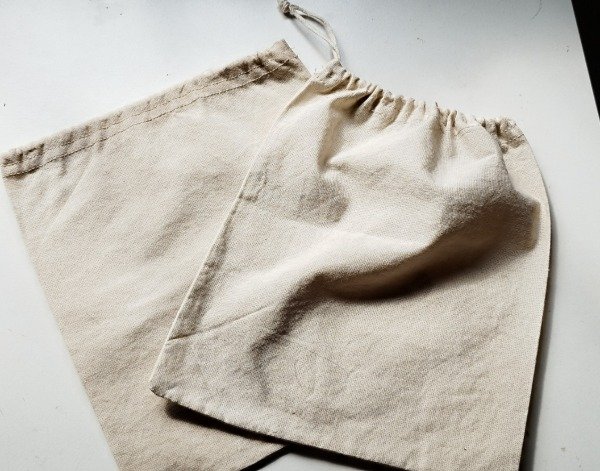 Producto - Bolsa de lienzo con cordón 25x30 por 100 unidades