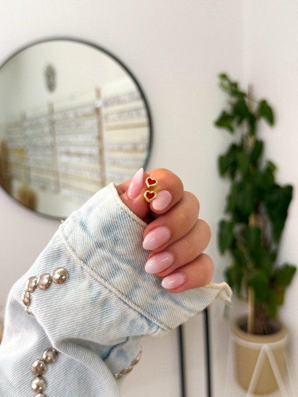 Producto - Abridores bañado en oro corazónes rojos