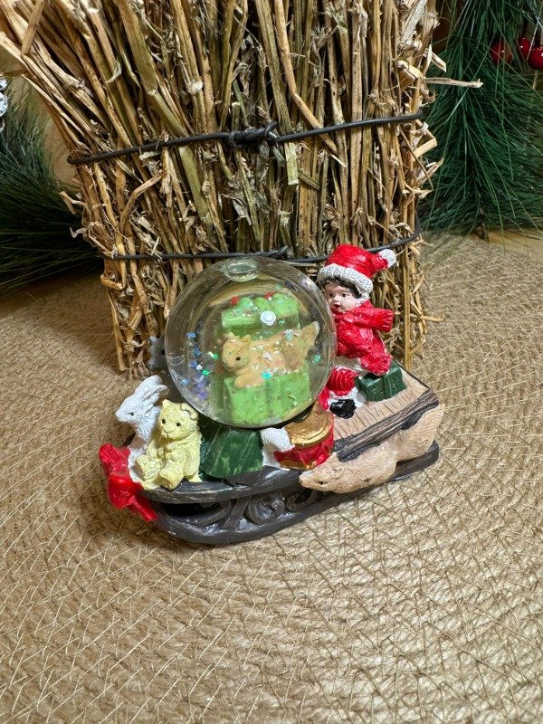 Producto - Bola de nieve trineo con niña y animales (Efectivo: 19.920)