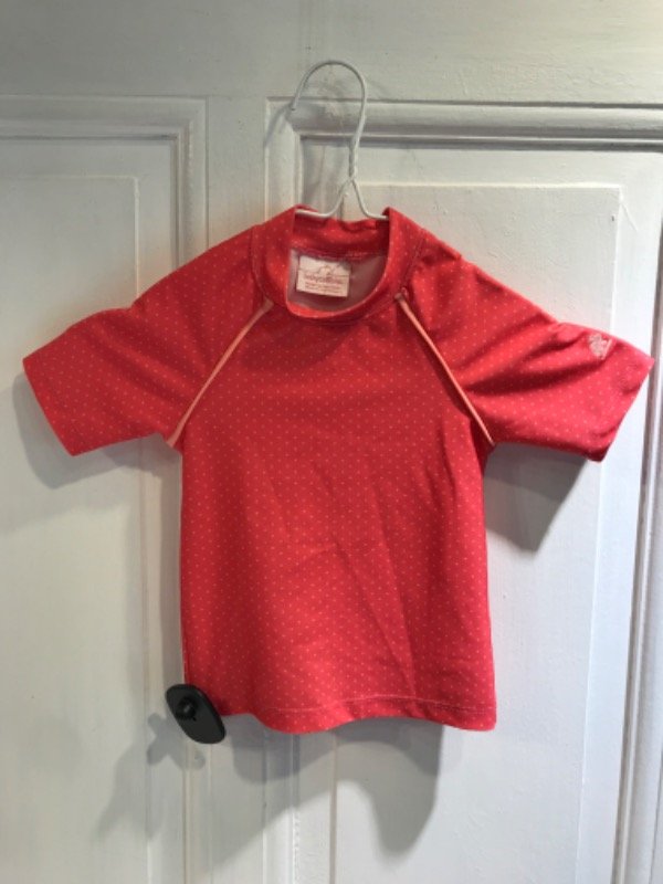 Producto - Remera BABY COTTONS de agua UV rosa con puntos- Talle 12 m- PRECIO: 14x