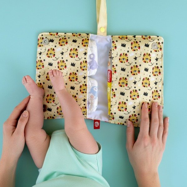 Producto - Portapañal Inti el león + tarjetón de bienvenida