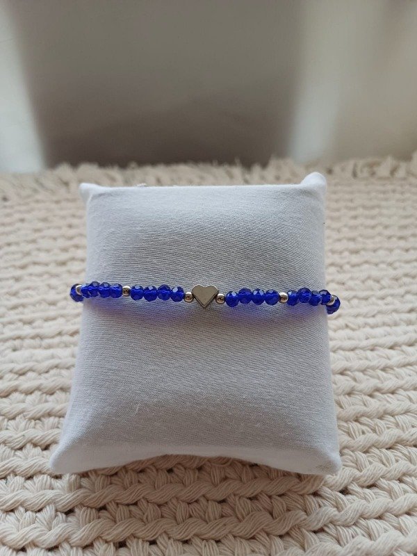 Producto - Pulsera cristal de roca con dije corazón azules