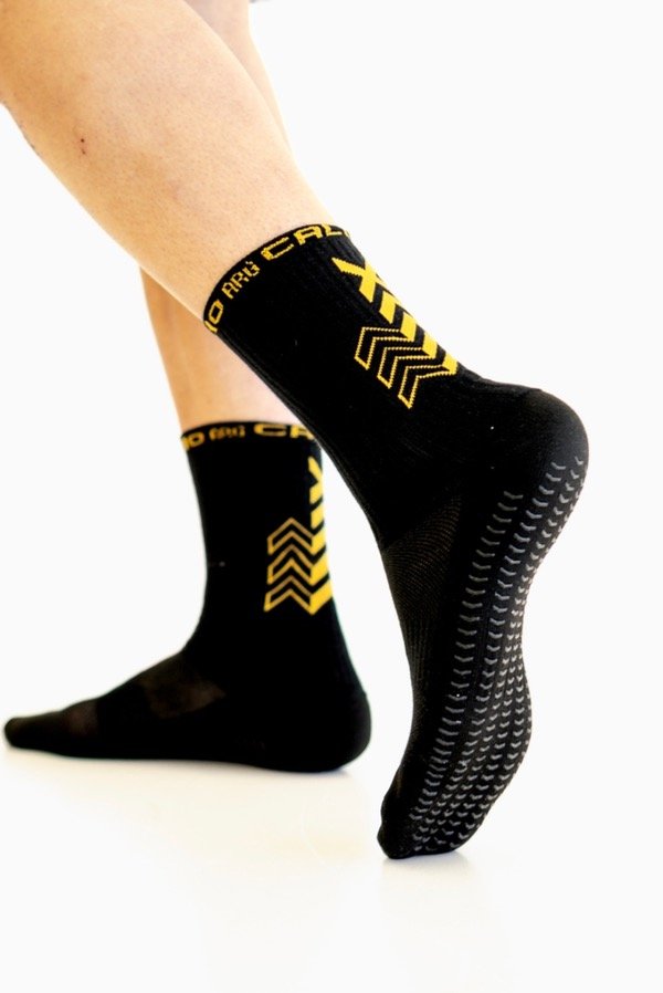 Producto - ANTIDESLIZANTES MARCA CALCIO NEGRO CON AMARILLO