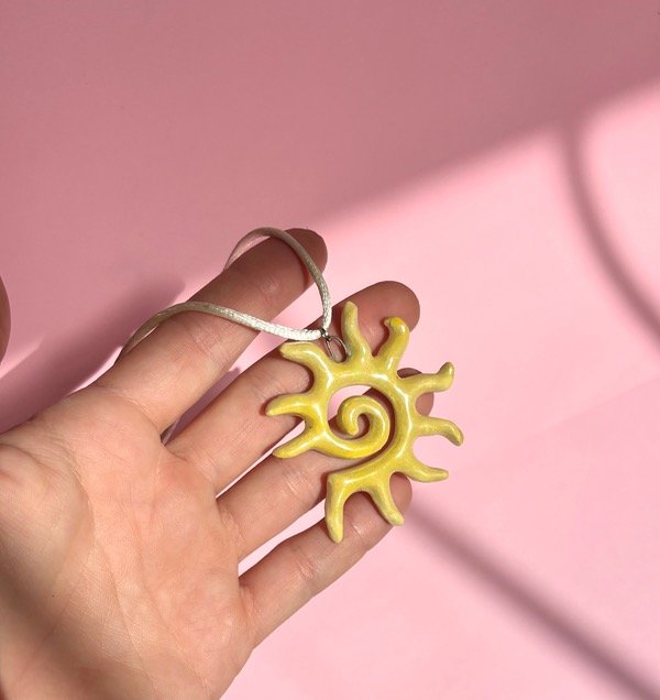 Producto - Sol Espiral BIFAS Natural y Amarillo Tornasol