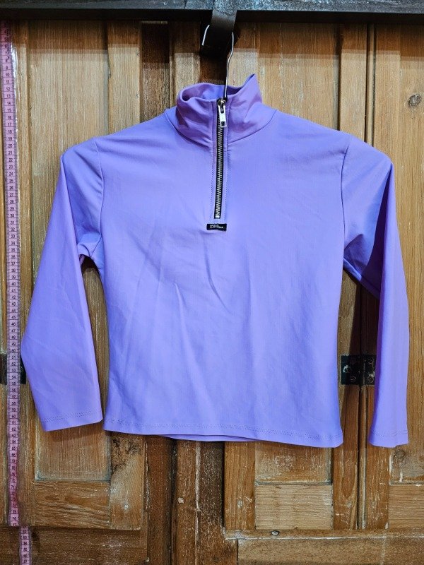 Producto - Polera Cross Clothing Lila t.M