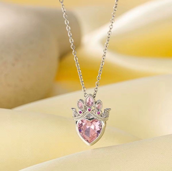 Producto - Collar de corazon plateado con corona rosa