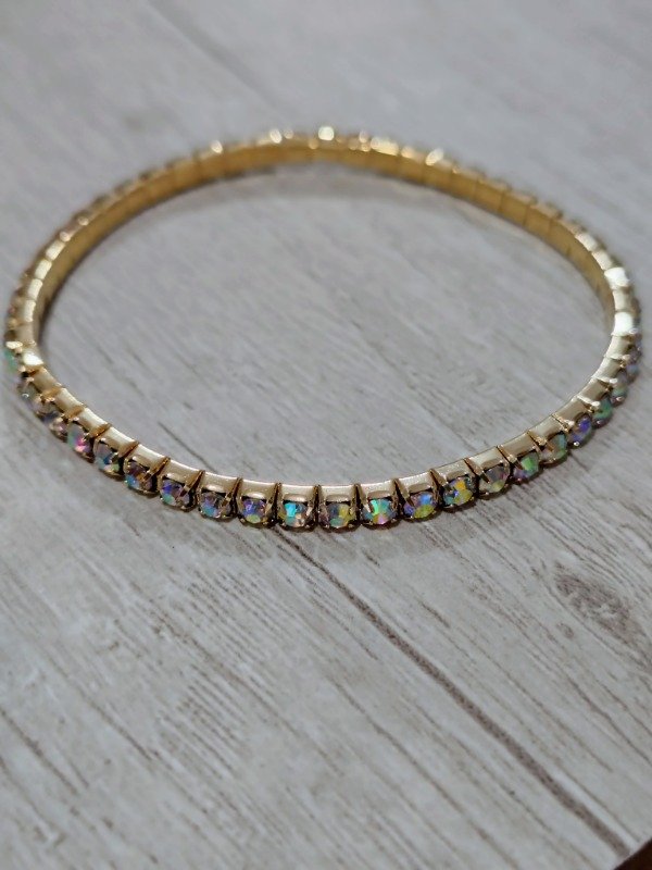 Producto - Pulsera elástica dorada con strass tornasolados
