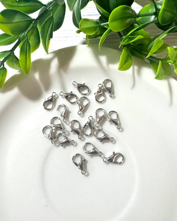Producto - MOSQUETÓN NIQUEL 10MM