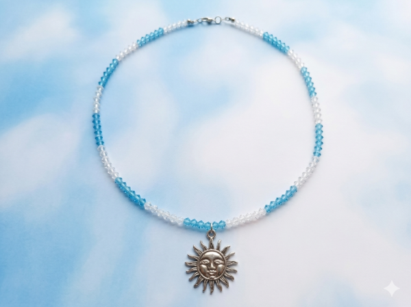 Producto - Collar en cristal de roca y sol de mayo plateado