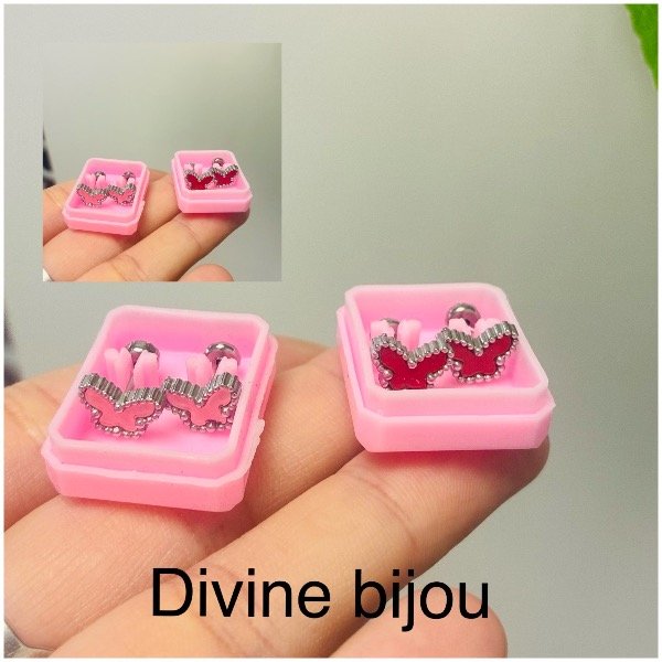 Producto - Abridores mariposas esmaltados acero