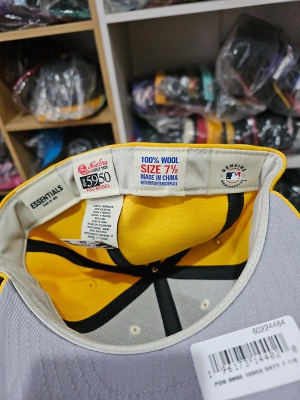 New era fear of god essentials yellow — imagen 4