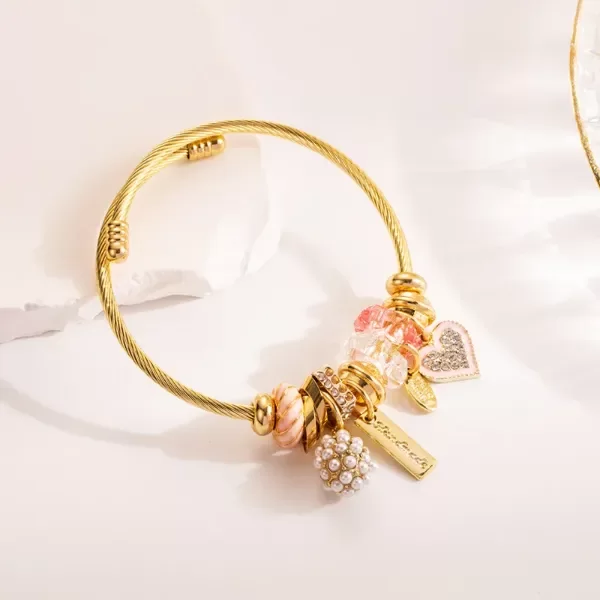 Producto - Pulsera charms dorada