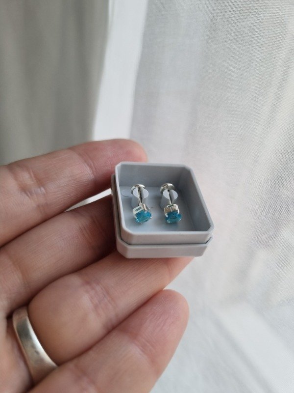 Producto - Abridor cubic celeste cuadrado