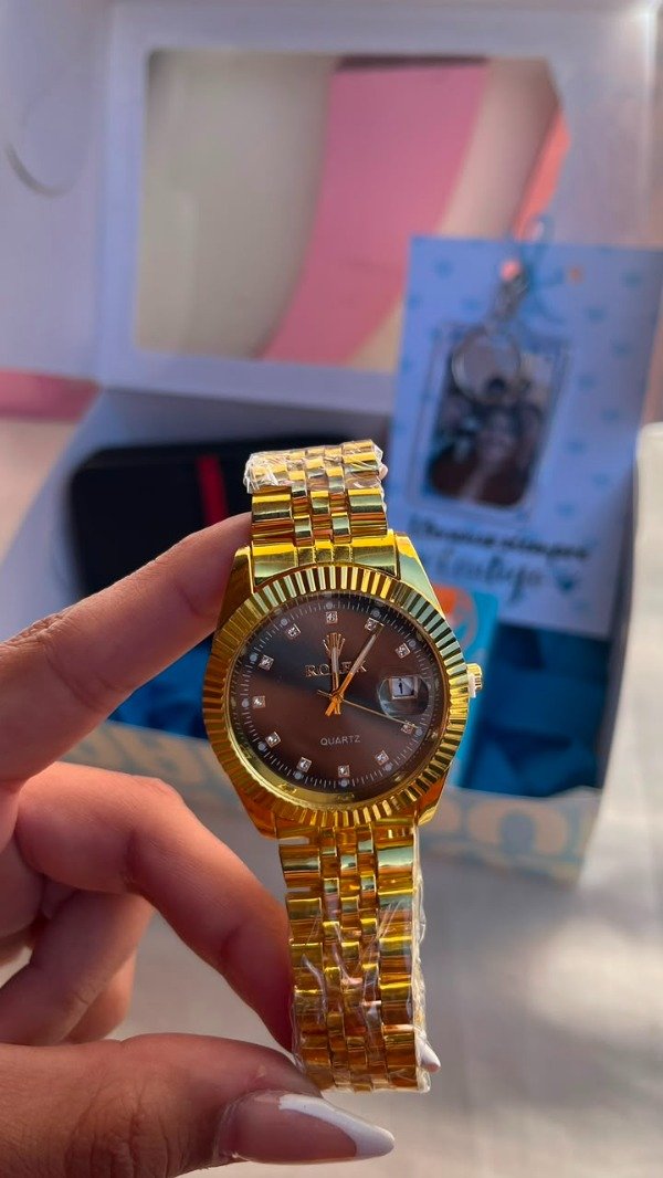 Producto - Reloj rolex dorado fondo negro
