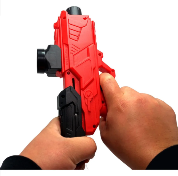 Producto - Pistola Lanza Dardos Y Balas hidrogel 2en1 + Muñeco De Accion - 1