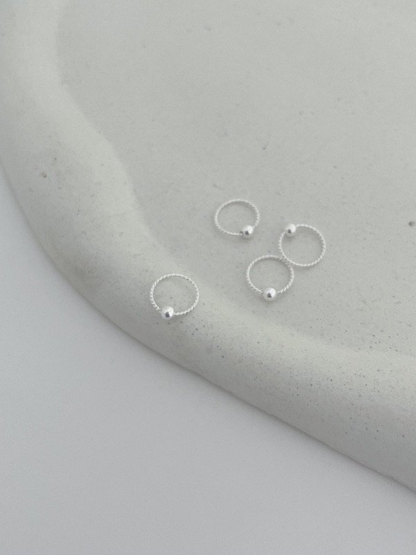 Producto - Piercing entramado con bolita 0,8cm