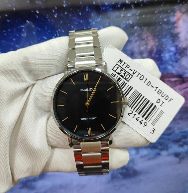 Producto - Casio mtp vt01 plateado fondo negro